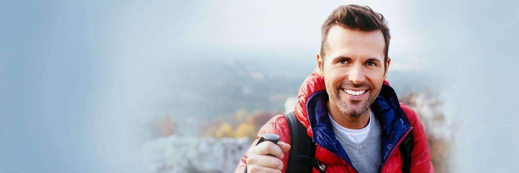 man smiling after visiting The Smile Suite